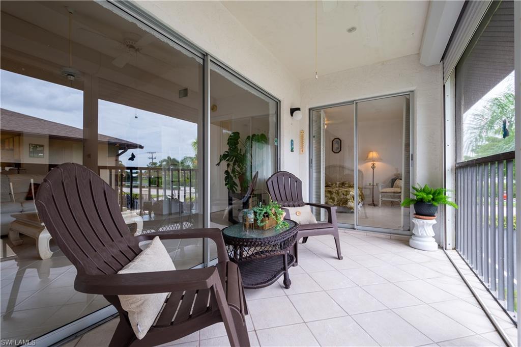 5693 Rattlesnake Hammock Road, Unit 201A Naples, FL 34113 - Photo 14 of 21 Screened Balcony