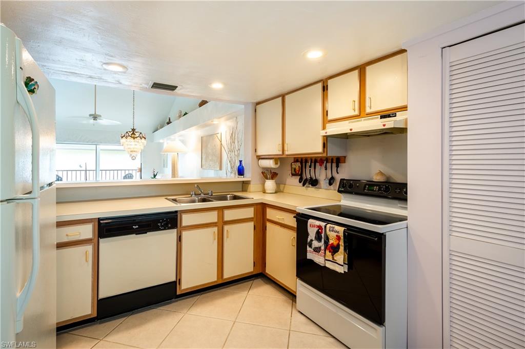 5693 Rattlesnake Hammock Road, Unit 201A Naples, FL 34113 - Photo 16 of 21 Kitchen