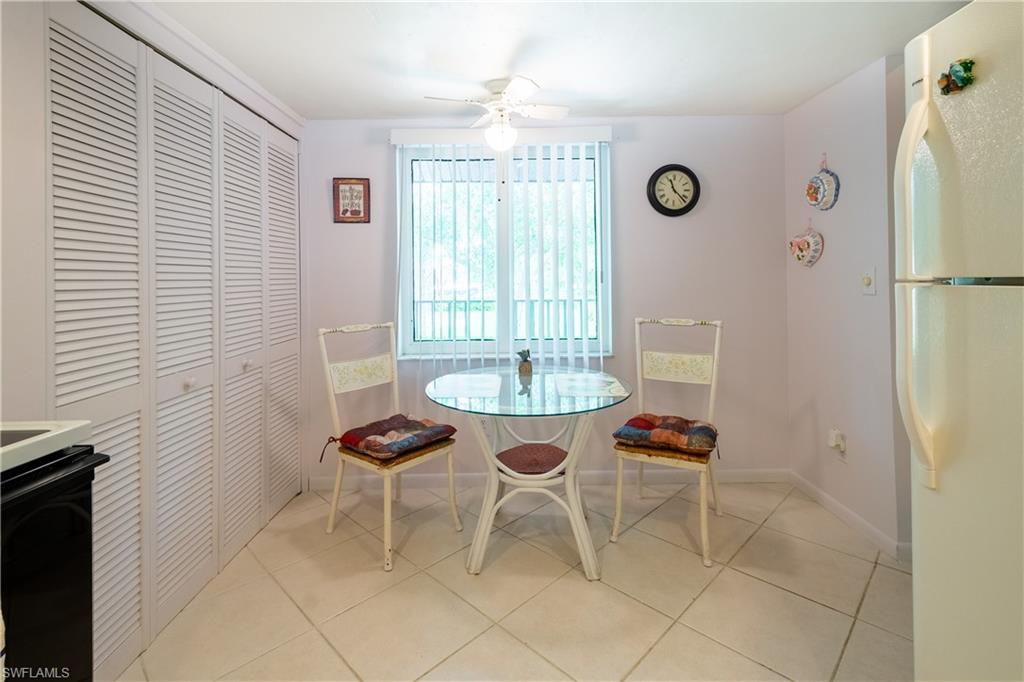 5693 Rattlesnake Hammock Road, Unit 201A Naples, FL 34113 - Photo 17 of 21 Dining area