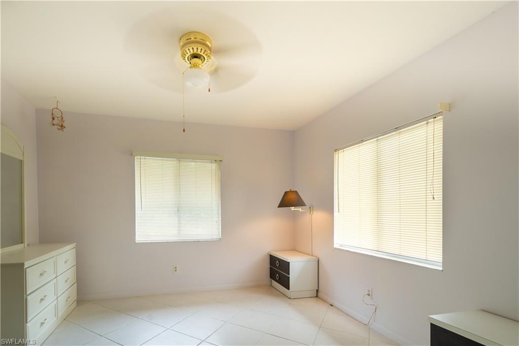 5693 Rattlesnake Hammock Road, Unit 201A Naples, FL 34113 - Photo 18 of 21 Second Bedroom