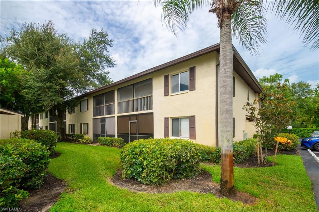 5693 Rattlesnake Hammock Road, Unit 201A Naples, FL 34113 - Photo 3 of 21 Gallery Image 3
