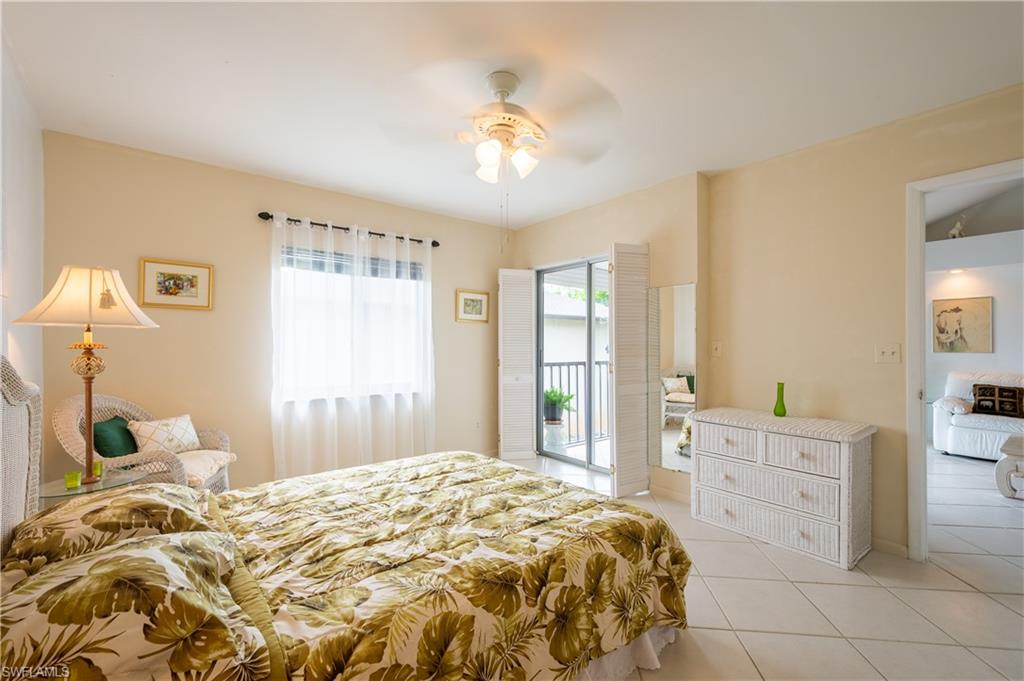 5693 Rattlesnake Hammock Road, Unit 201A Naples, FL 34113 - Photo 6 of 21 Master bedroom