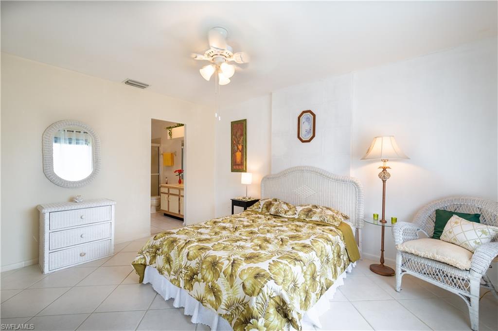 5693 Rattlesnake Hammock Road, Unit 201A Naples, FL 34113 - Photo 9 of 21 Master Bedroom