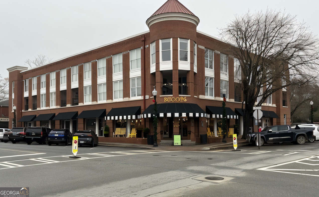 a front view of a building with street
