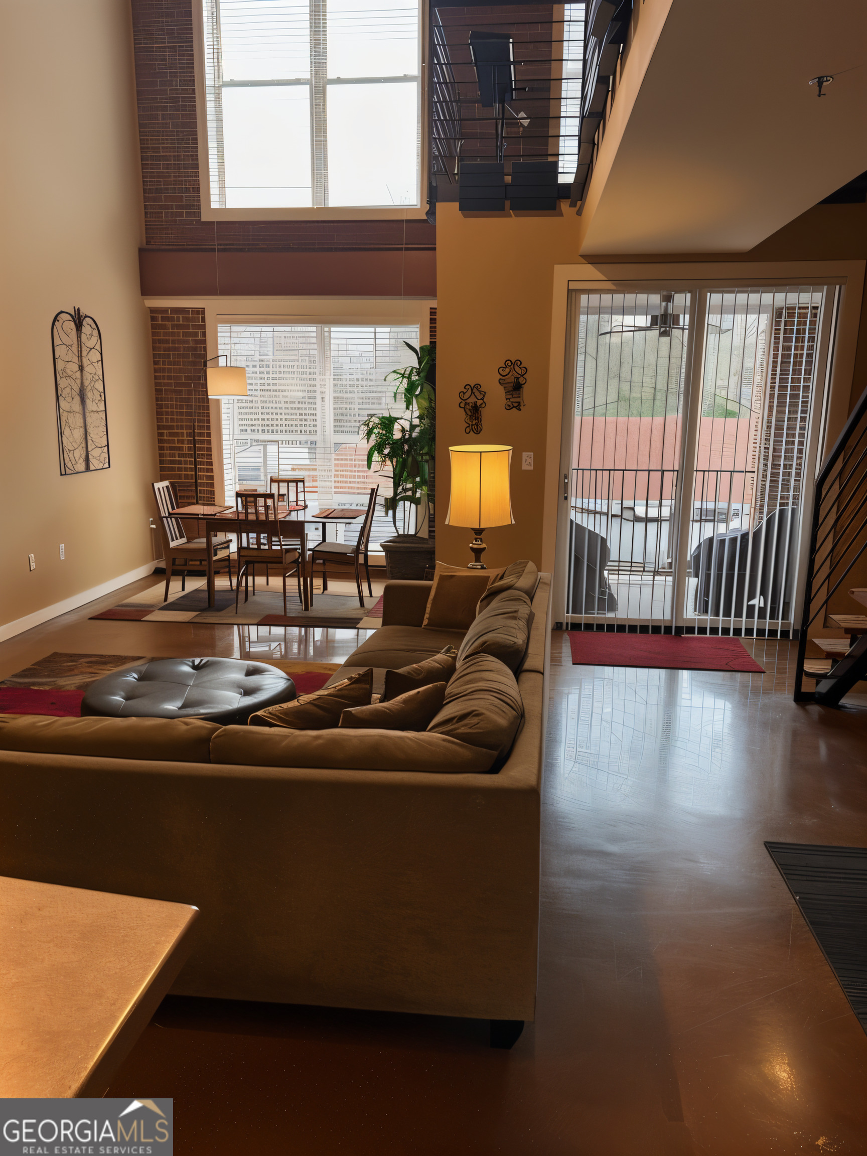 1133 Church Street, Unit 1 Covington, GA 30014 - Photo 11 of 26 a living room with furniture and floor to ceiling windows