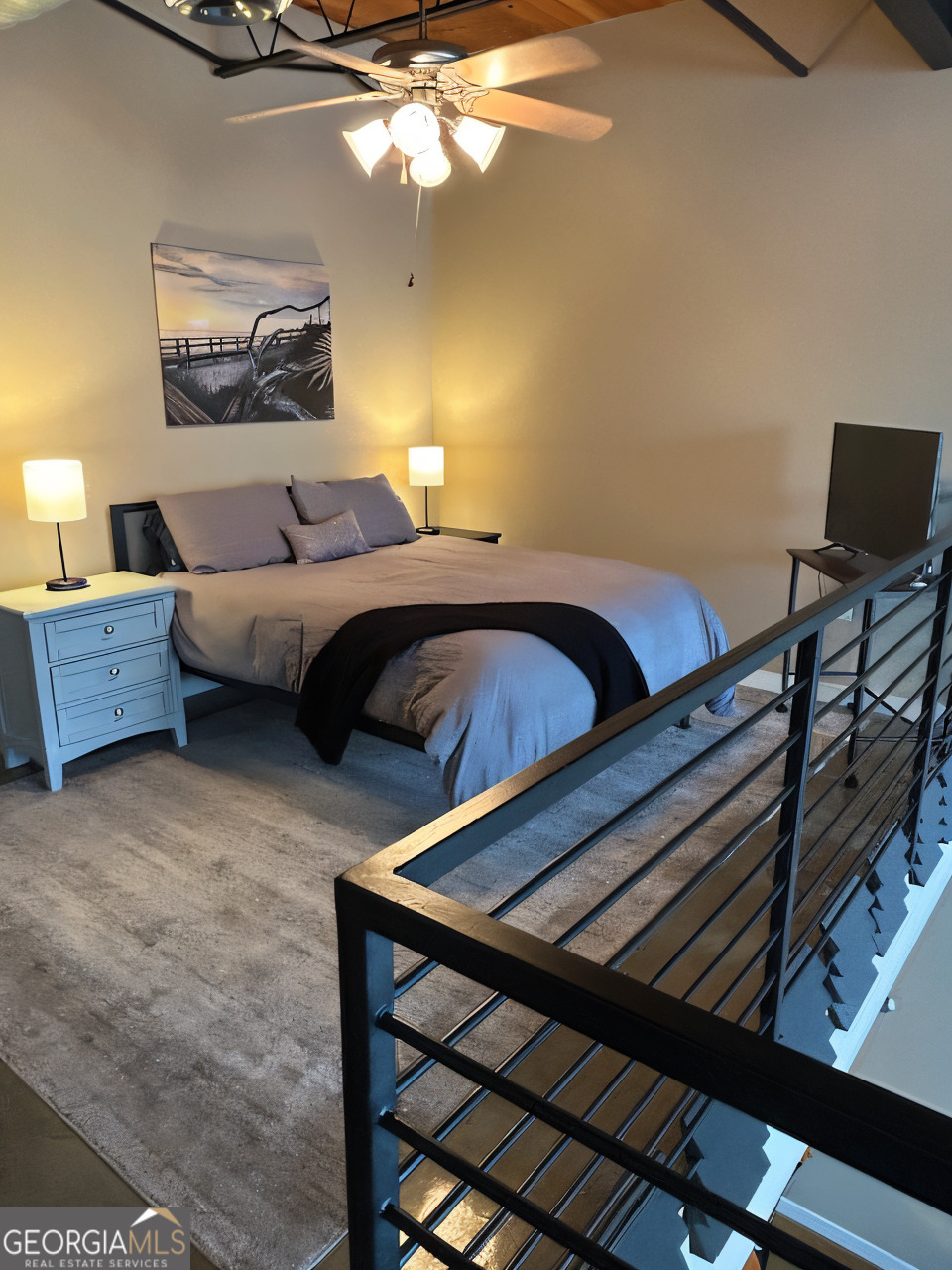 1133 Church Street, Unit 1 Covington, GA 30014 - Photo 18 of 26 a bedroom with a bed and wooden floor