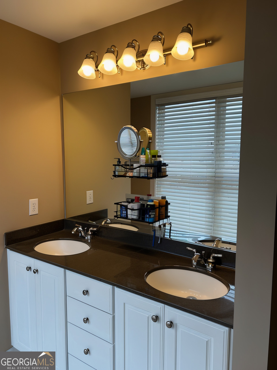 1133 Church Street, Unit 1 Covington, GA 30014 - Photo 19 of 26 a bathroom with a sink and a mirror