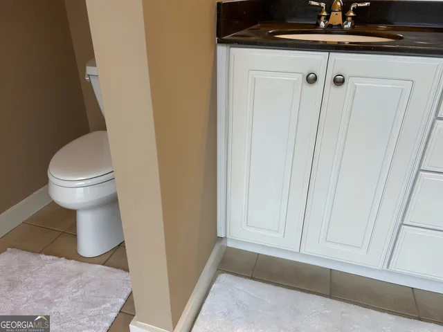 a bathroom with a sink and a toilet