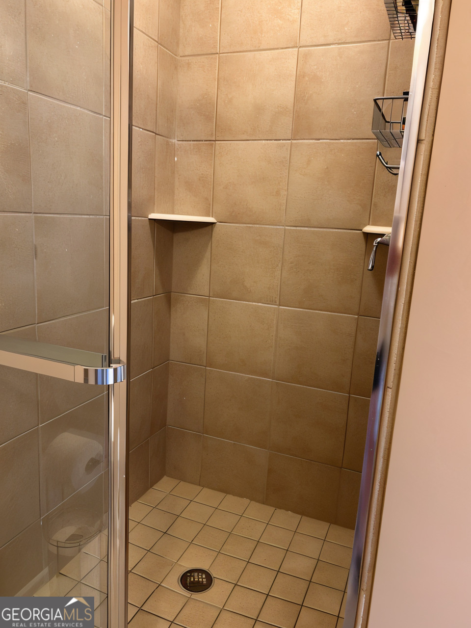 1133 Church Street, Unit 1 Covington, GA 30014 - Photo 7 of 26 a bathroom with a shower