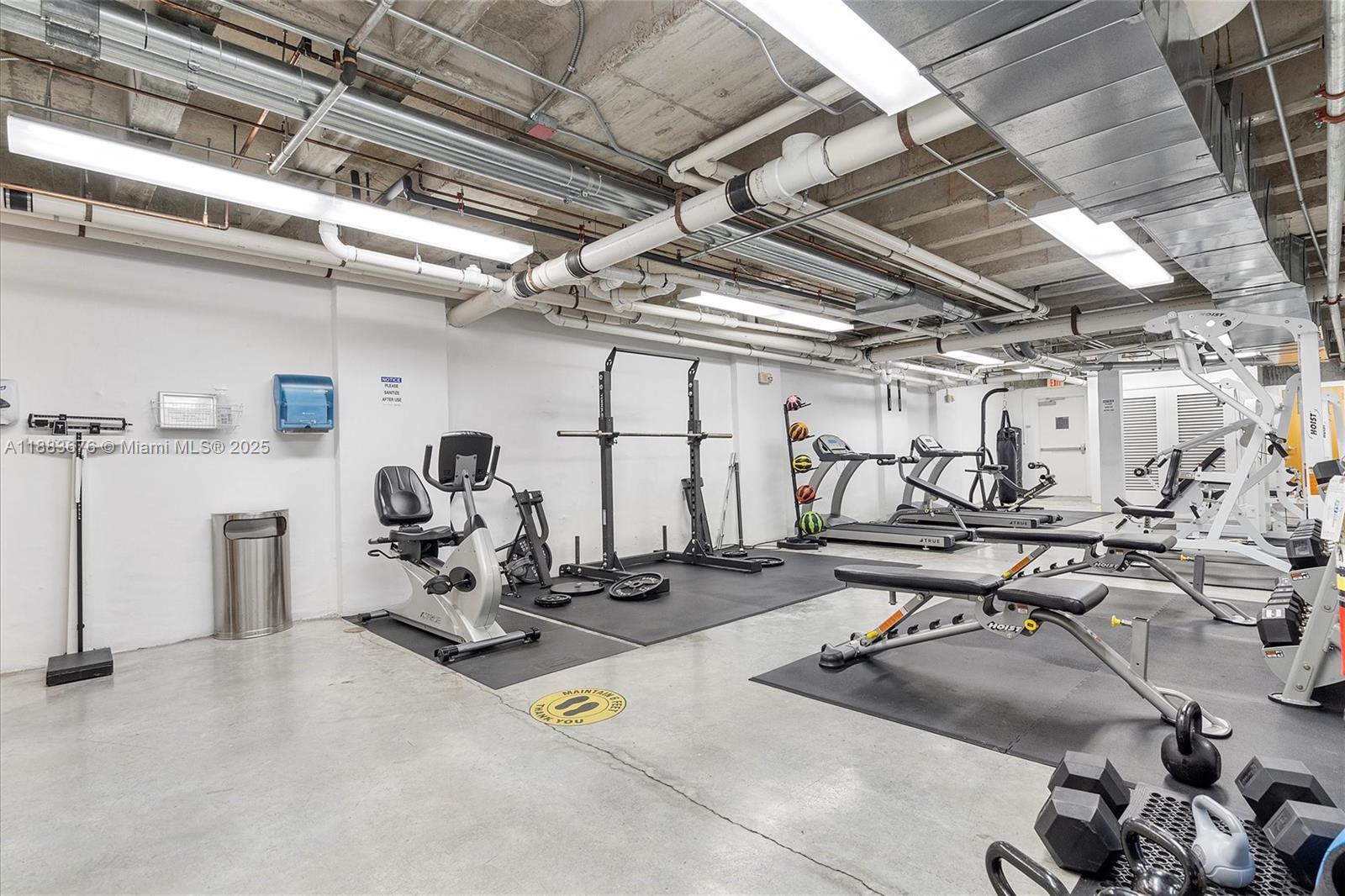 8101 Biscayne Boulevard, Unit R515 Miami, FL 33138 - Photo 18 of 26 a view of a room with gym equipment