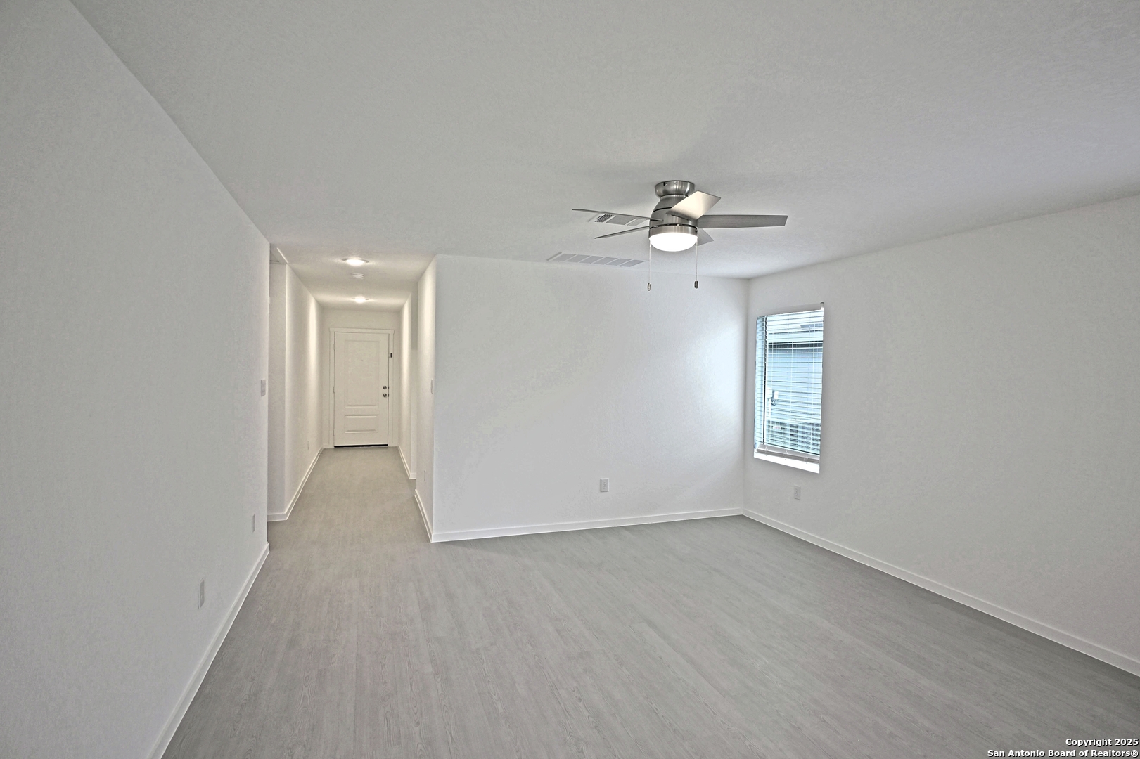 3817 Low Tide Seguin, TX 78155 - Photo 12 of 24 a view of a room with a ceiling fan window and a ceiling fan
