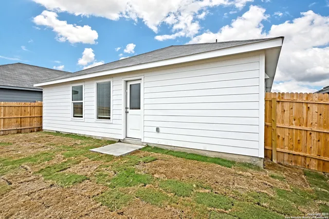 a bathroom with a sink and shower