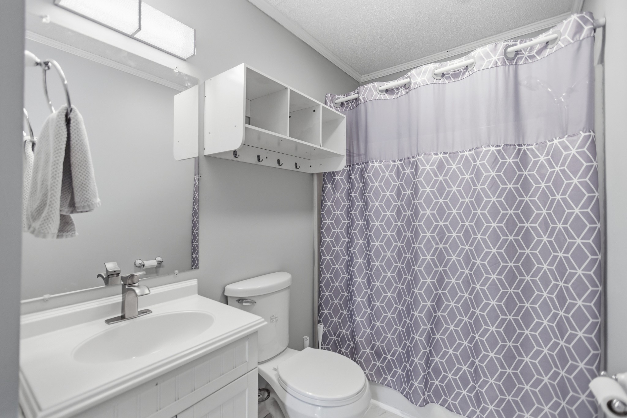 206 Weaver Street Tullahoma, TN 37388 - Photo 18 of 40 a bathroom with a sink a toilet and shower