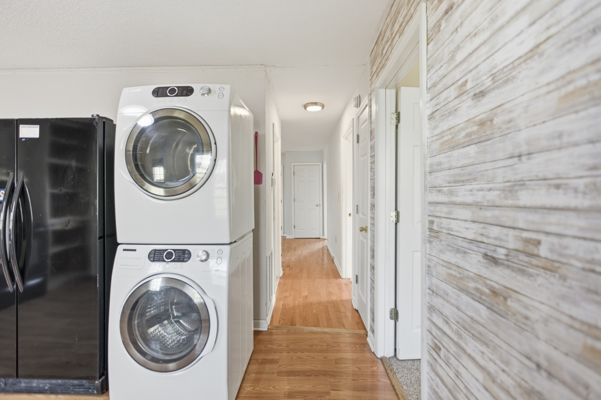 206 Weaver Street Tullahoma, TN 37388 - Photo 24 of 40 a view of a hallway with washer and dryer