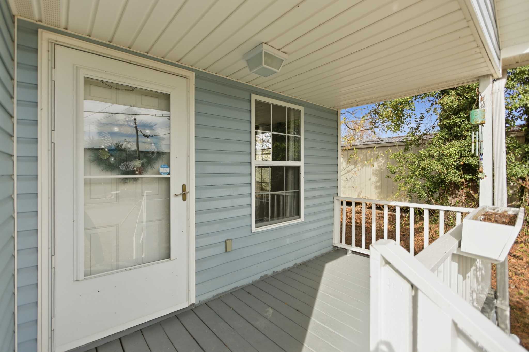 206 Weaver Street Tullahoma, TN 37388 - Photo 4 of 40 a view of a balcony with wooden floor
