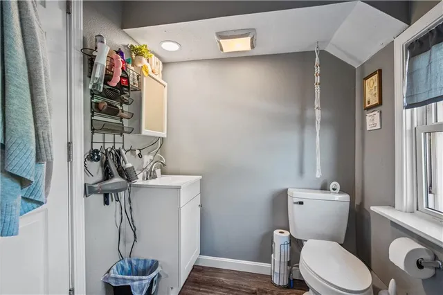 a bathroom with a toilet and a sink
