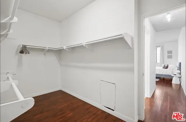 a view of livingroom with hardwood floor and a ceiling fan
