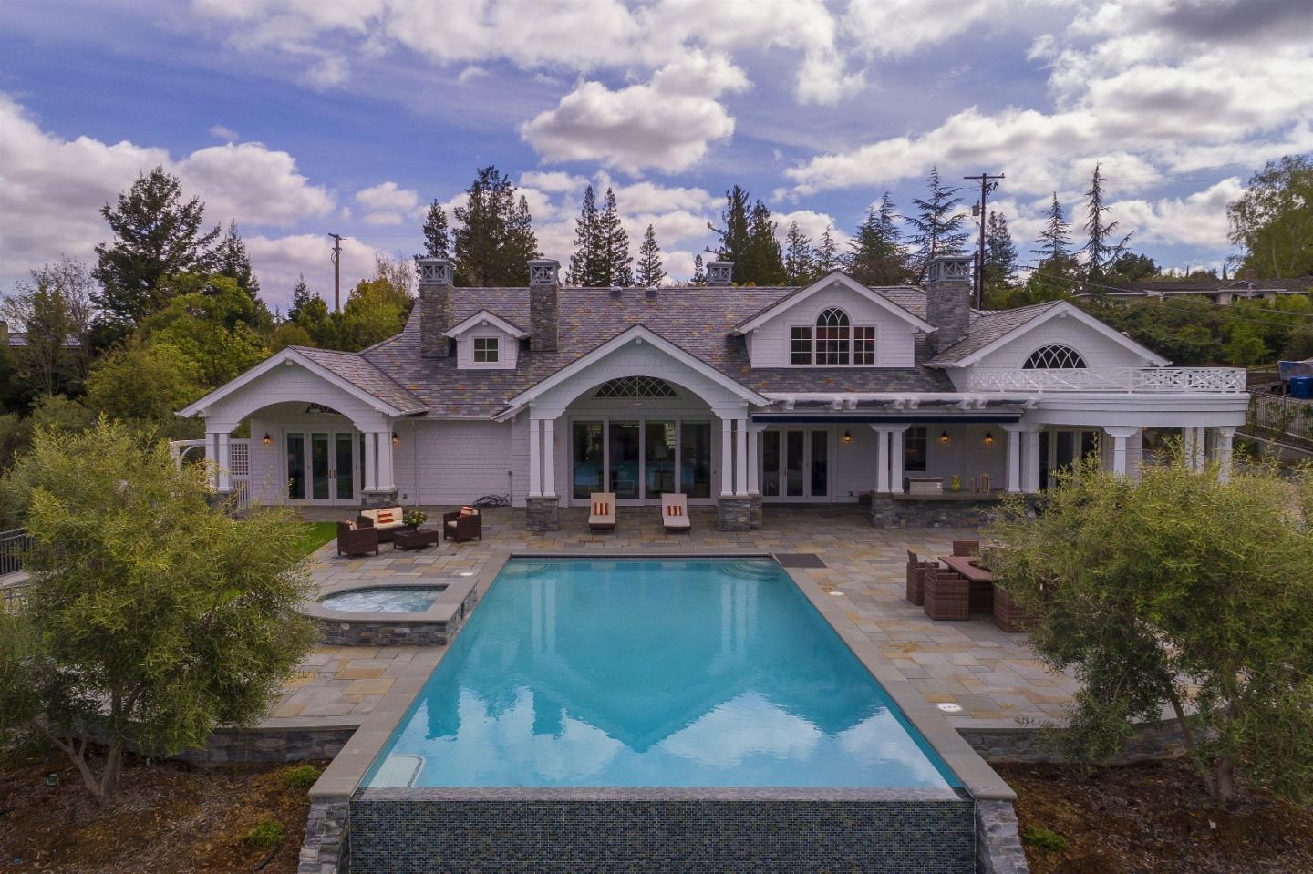 14966 Sobey Road Saratoga, CA 95070 - Photo 11 of 60 a front view of a house with garden