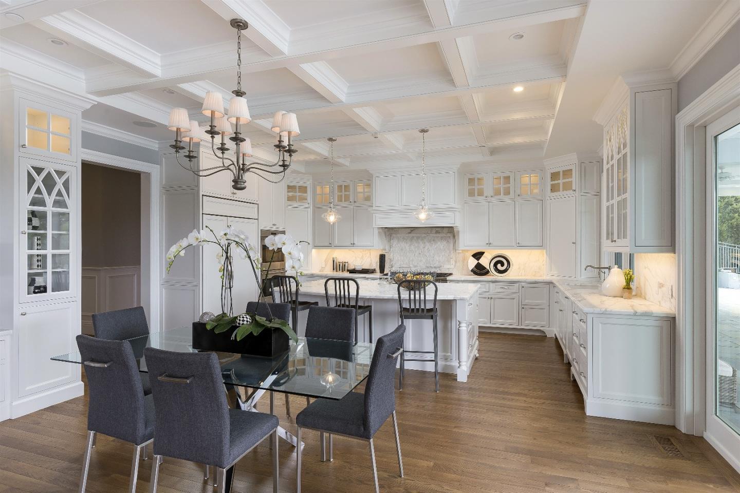 14966 Sobey Road Saratoga, CA 95070 - Photo 26 of 60 a view of a dining room with furniture and chandelier