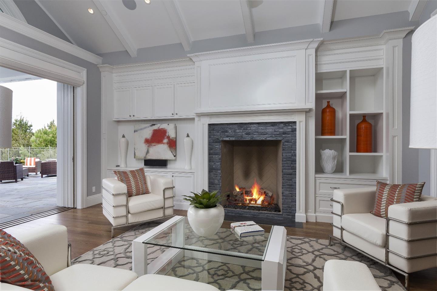 14966 Sobey Road Saratoga, CA 95070 - Photo 28 of 60 a living room with furniture and a fireplace