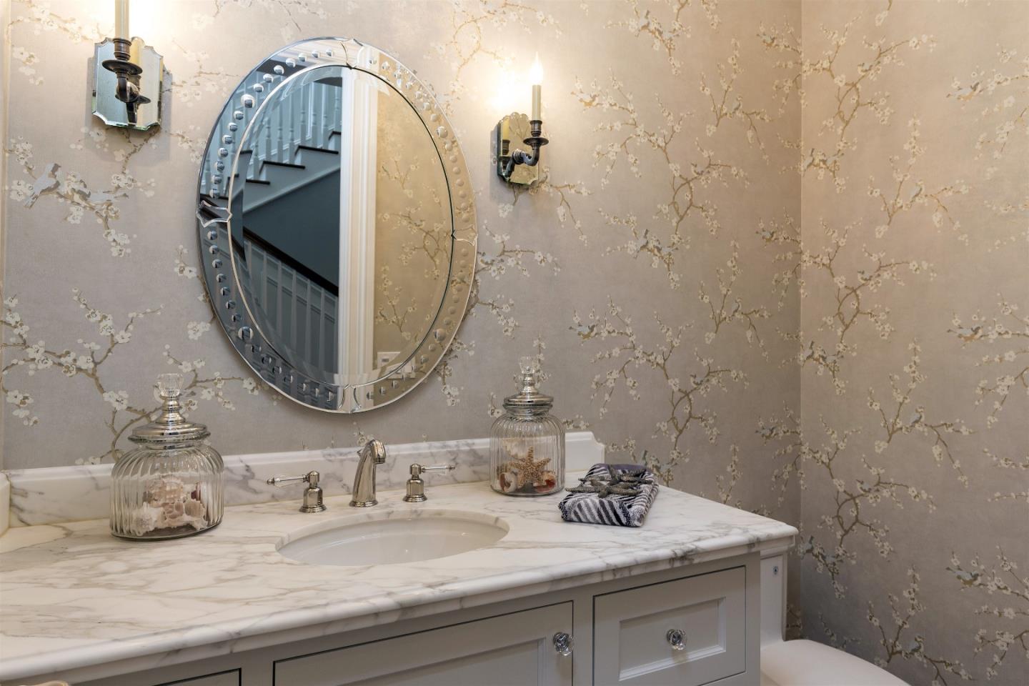 14966 Sobey Road Saratoga, CA 95070 - Photo 30 of 60 a bathroom with a sink and a mirror