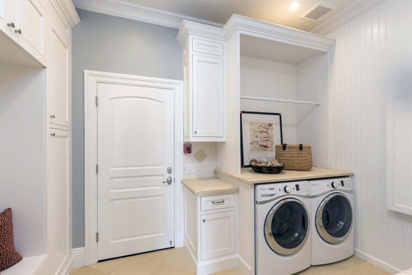 14966 Sobey Road Saratoga, CA 95070 - Photo 31 of 60 a hallway with washer and dryer
