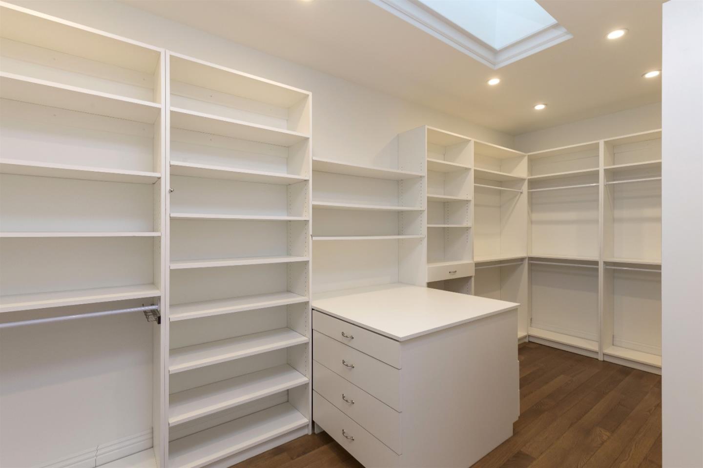 14966 Sobey Road Saratoga, CA 95070 - Photo 38 of 60 a room with walk in closet and empty racks