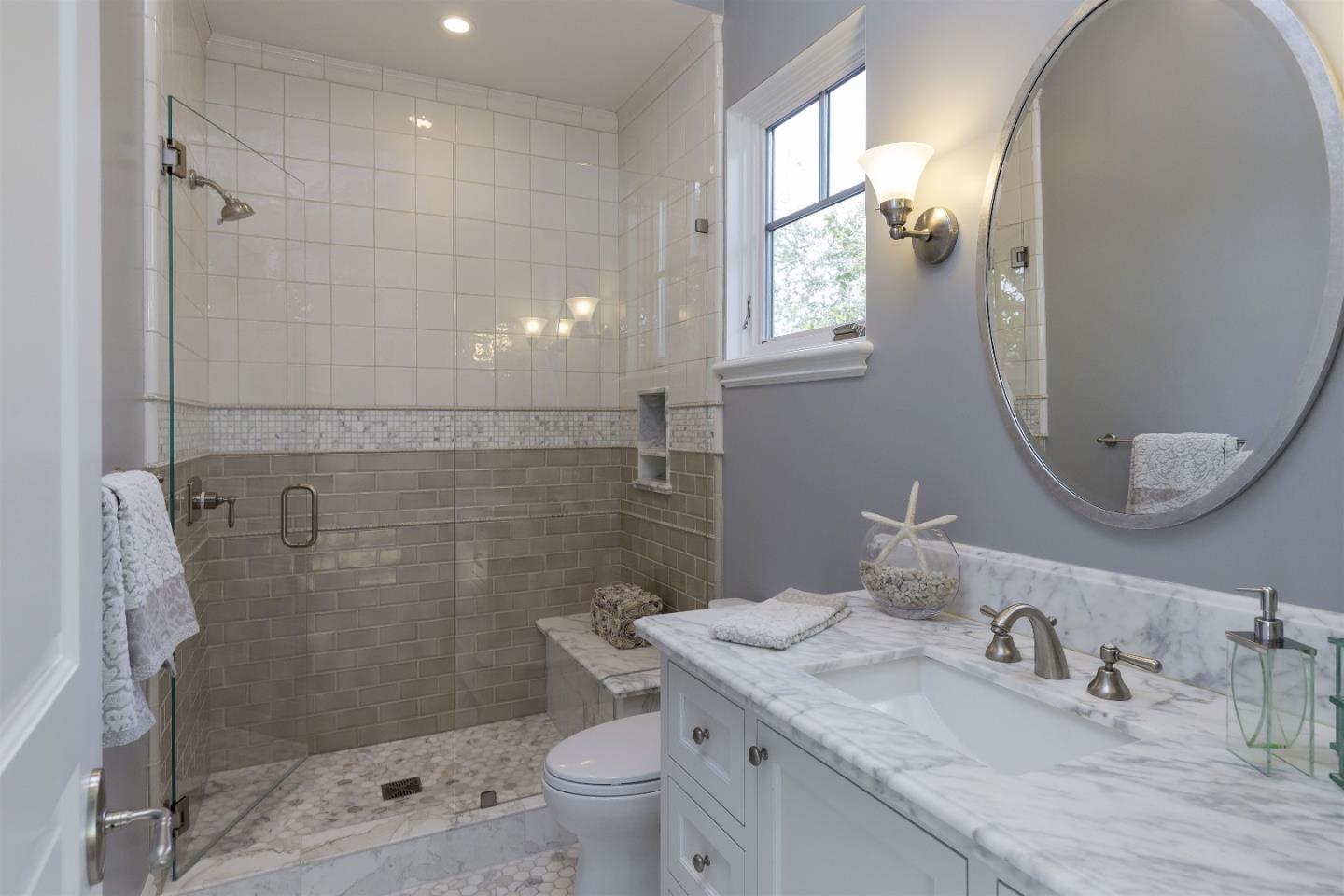14966 Sobey Road Saratoga, CA 95070 - Photo 46 of 60 a bathroom with a granite countertop sink toilet and shower