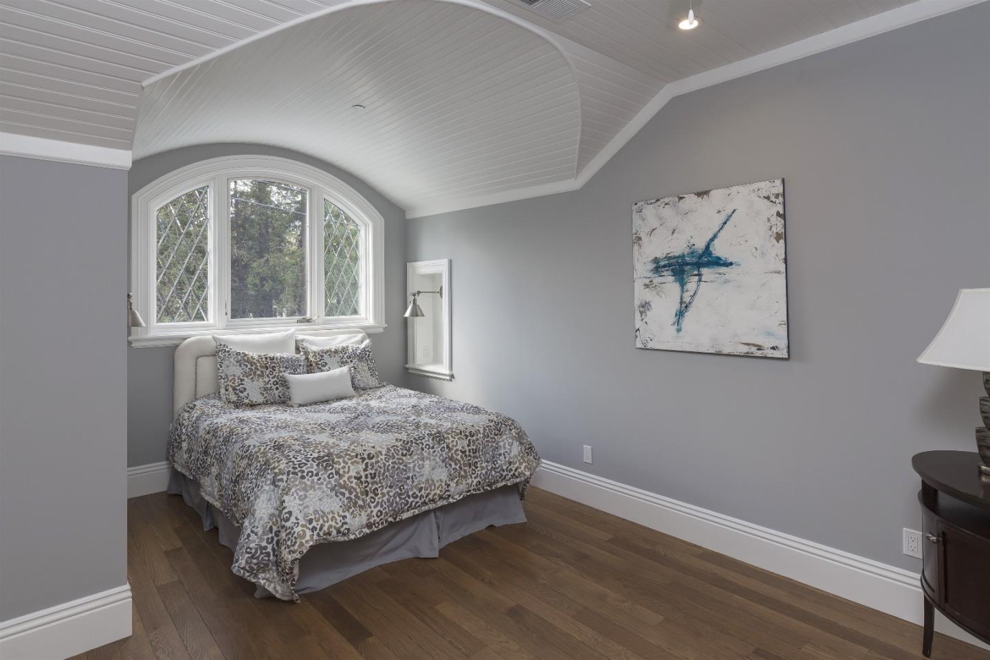 14966 Sobey Road Saratoga, CA 95070 - Photo 47 of 60 a bedroom with a large bed and a window