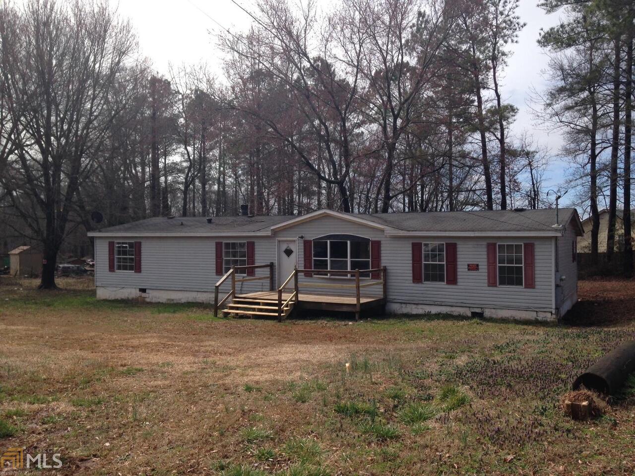 400 North Van Wert Road Villa Rica, GA 30180 - Photo 1 of 1 a front view of a house with a yard
