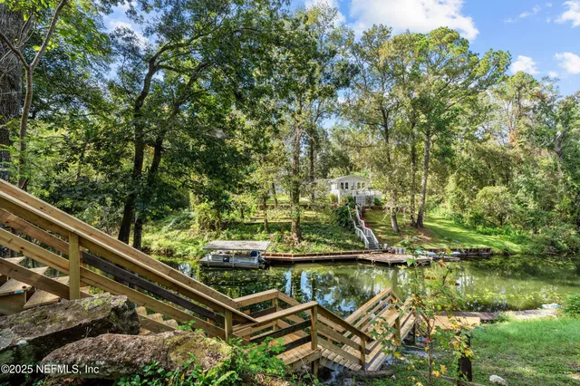 a view of a lake from a balcony