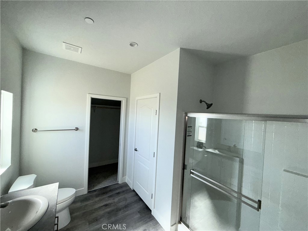 10633 Bromley Road Pinon Hills, CA 92372 - Photo 9 of 13 a bathroom with a shower and a toilet