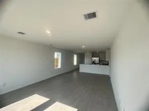 a view of a hallway with a couch