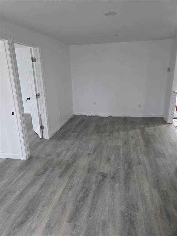6 French Street, Unit AA Billerica, MA 01821 - Photo 13 of 16 a view of a room with wooden floor