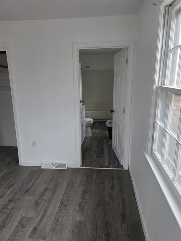 6 French Street, Unit AA Billerica, MA 01821 - Photo 16 of 16 a view of a hallway view with wooden floor and staircase