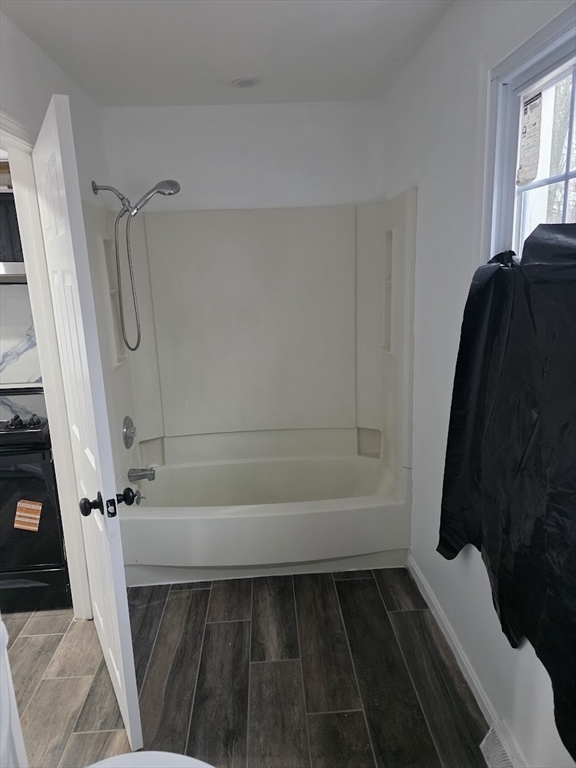 6 French Street, Unit AA Billerica, MA 01821 - Photo 8 of 16 a bathroom with a bathtub and shower