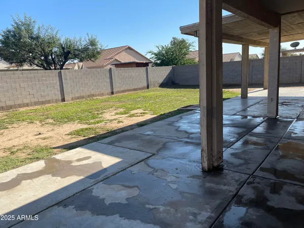 a view of a backyard with a garden