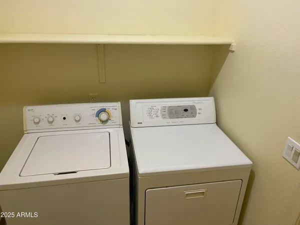 a close up view of washer and dryer with washer