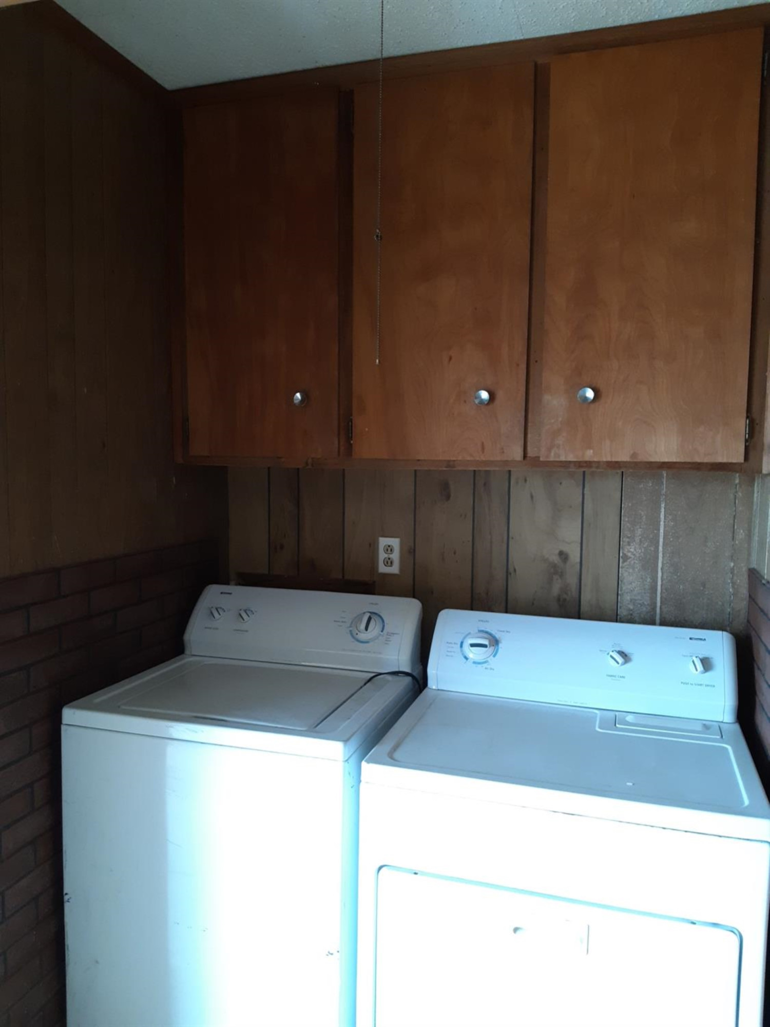 5113 13th Street Lubbock, TX 79416 - Photo 4 of 5 a utility room with dryer and washer