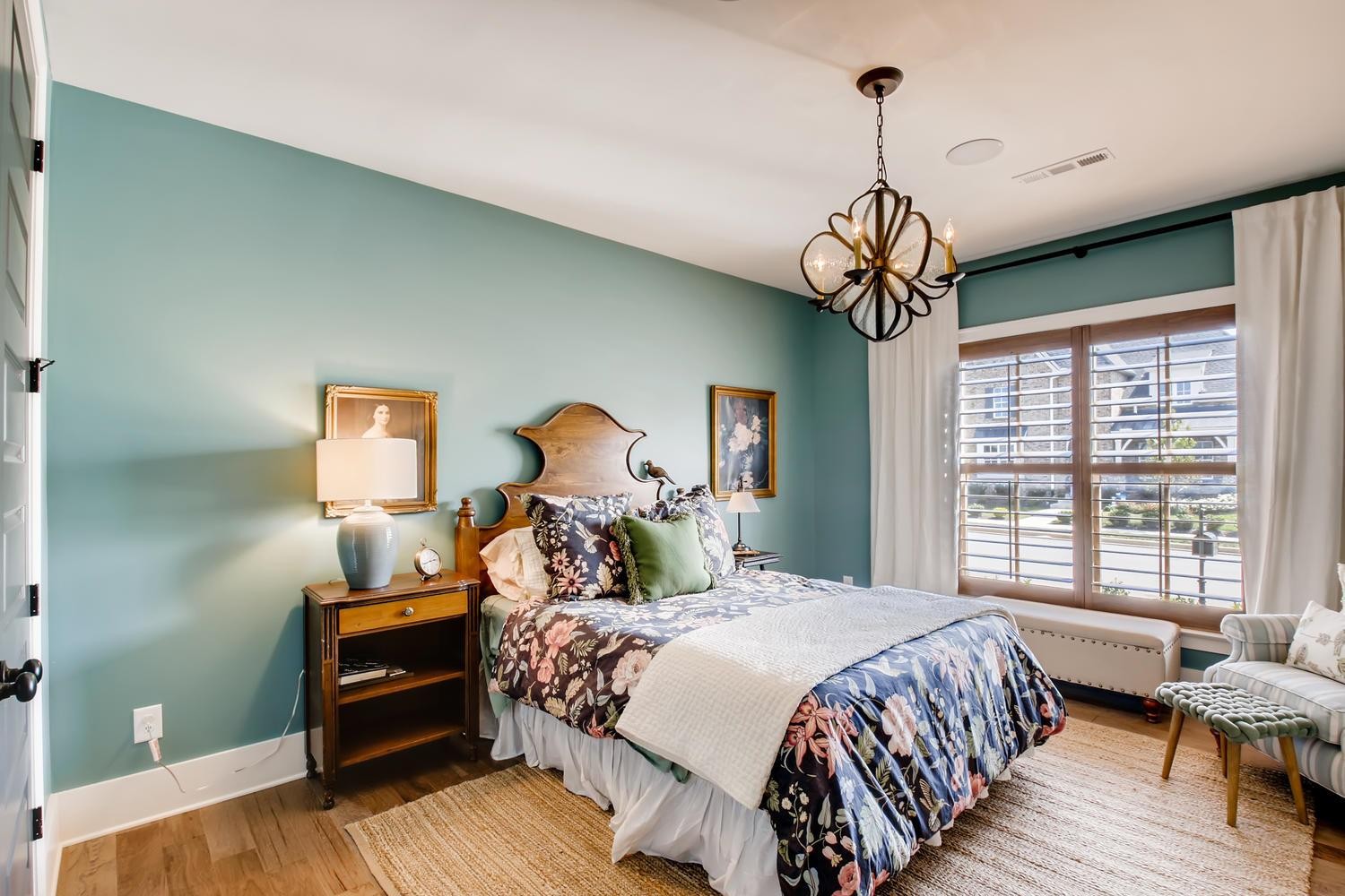 127 Vanner Road Mount Juliet, TN 37122 - Photo 17 of 29 a bedroom with a bed and a chandelier