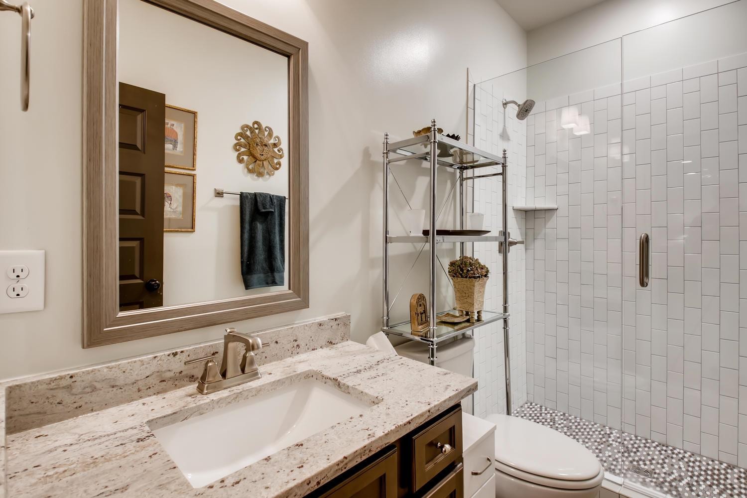 127 Vanner Road Mount Juliet, TN 37122 - Photo 22 of 29 a bathroom with a granite countertop sink toilet and shower