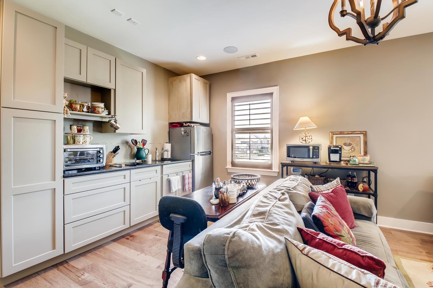 127 Vanner Road Mount Juliet, TN 37122 - Photo 23 of 29 a living room with stainless steel appliances furniture a rug and a window
