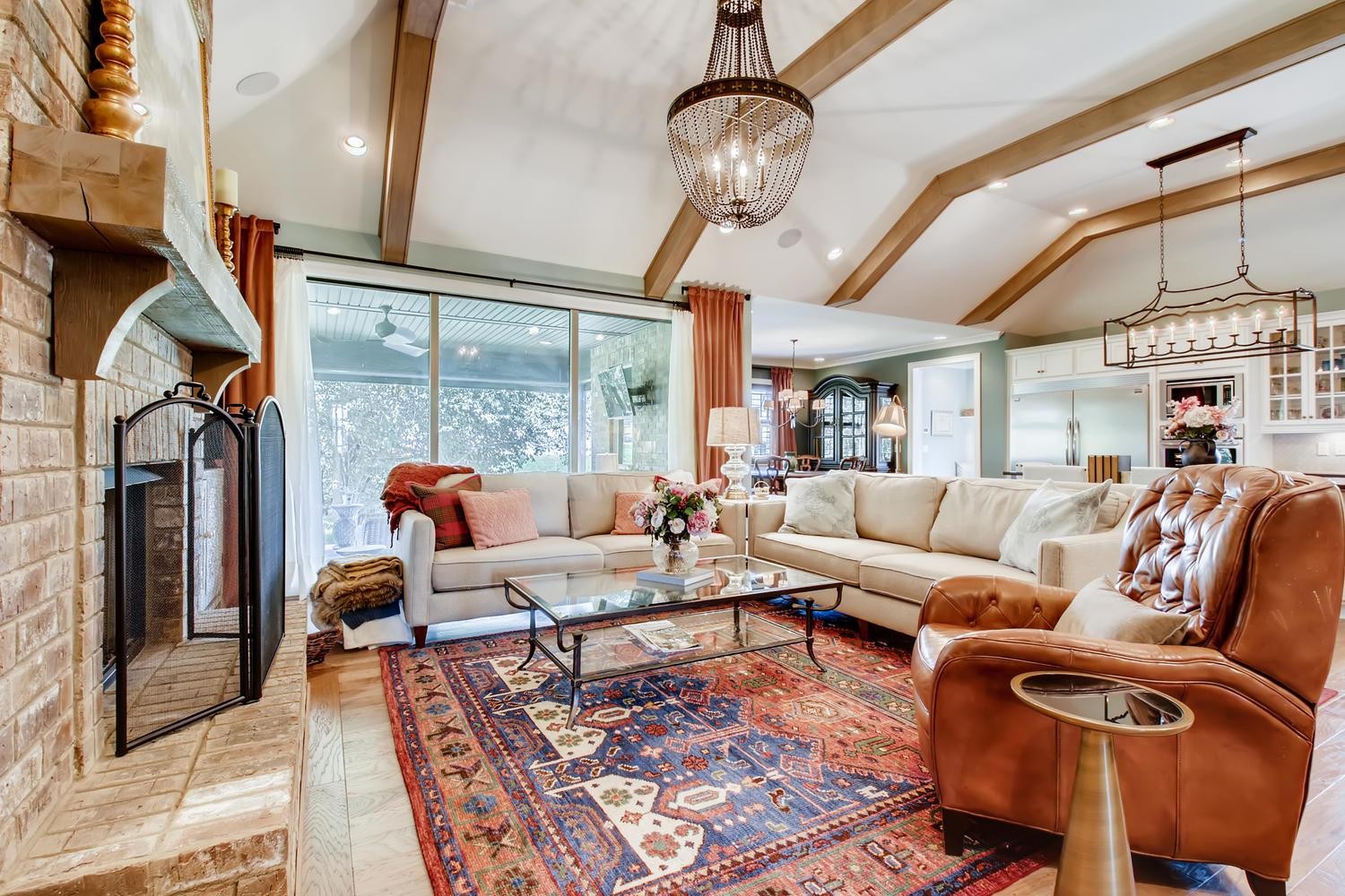127 Vanner Road Mount Juliet, TN 37122 - Photo 6 of 29 a living room with furniture a chandelier and a floor to ceiling window