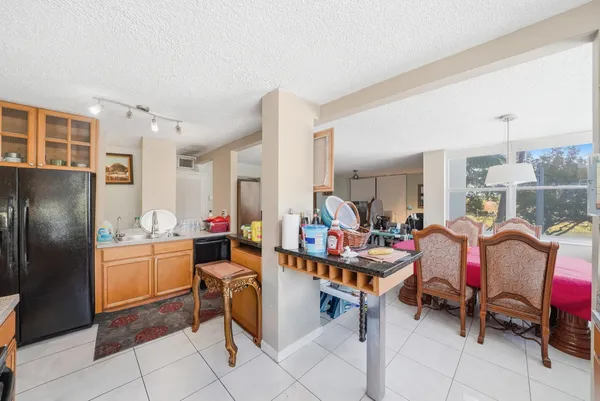 a living room with lots of furniture and appliances