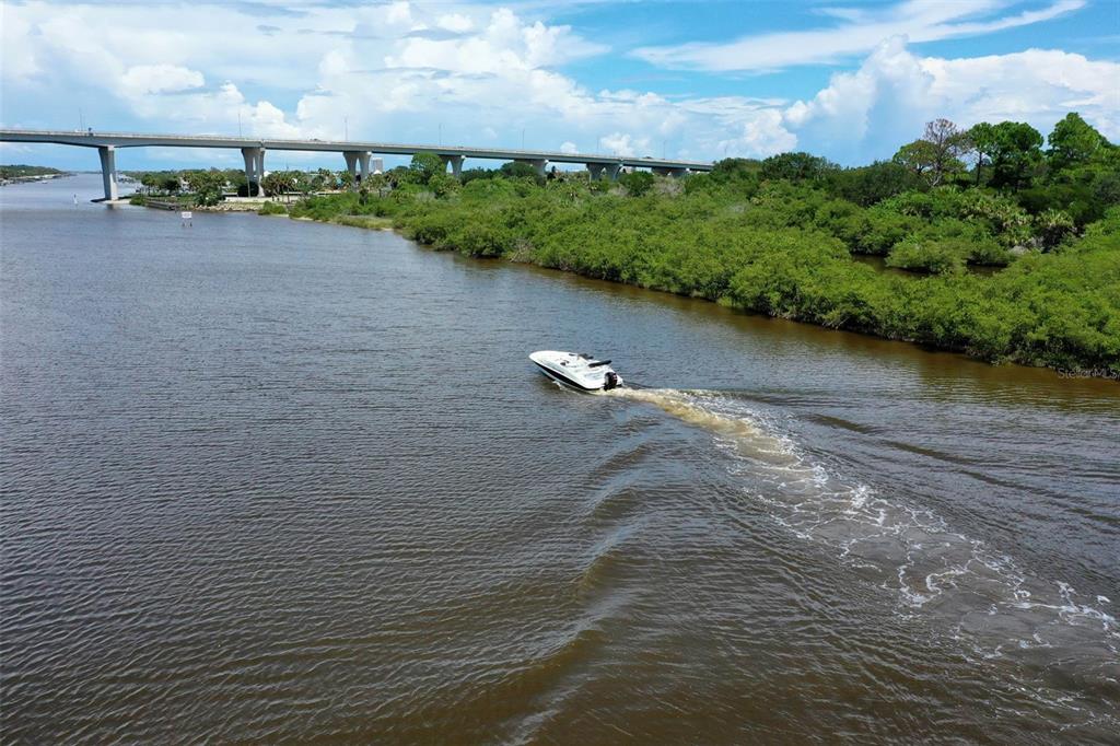 153 Coronado Road Flagler Beach, FL 32136 - Photo 15 of 19 a view of a lake with houses