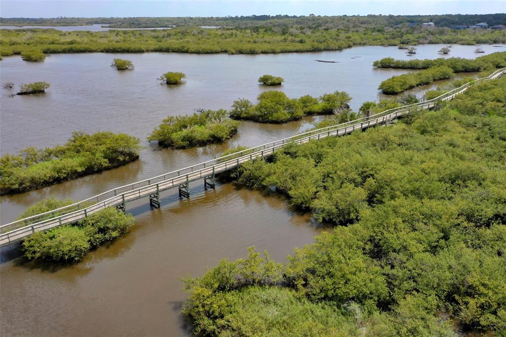 153 Coronado Road Flagler Beach, FL 32136 - Photo 19 of 19 an aerial view of a city with lake view