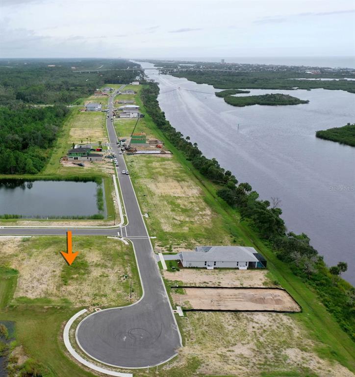 153 Coronado Road Flagler Beach, FL 32136 - Photo 2 of 19 a view of a swimming pool with an ocean view