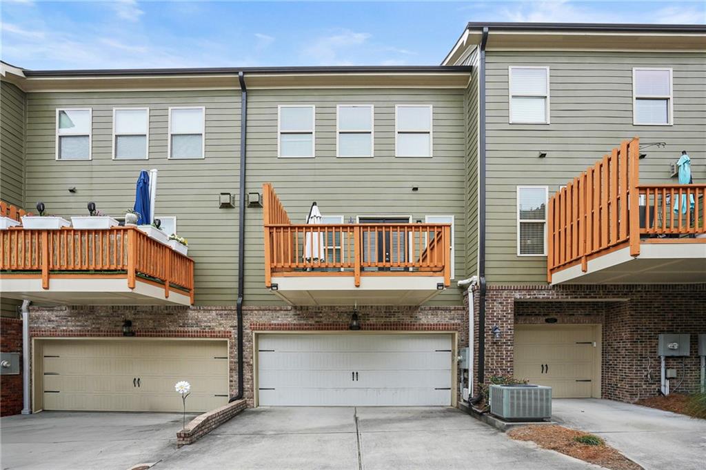 1221 Lavista Road Northeast Atlanta, GA 30324 - Photo 31 of 31 a front view of a house with garage