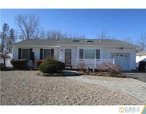 60 Club House Road Brick, NJ 08723 - Photo 1 of 23 a view of a house with backyard and sitting area