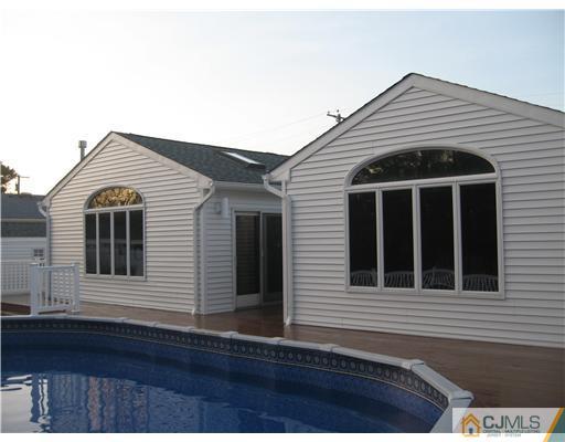 60 Club House Road Brick, NJ 08723 - Photo 21 of 23 a front view of a house